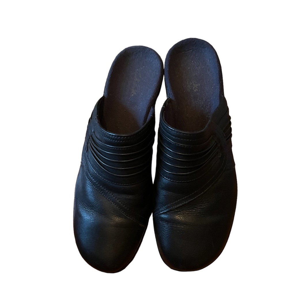 Clarks mules in great condition.